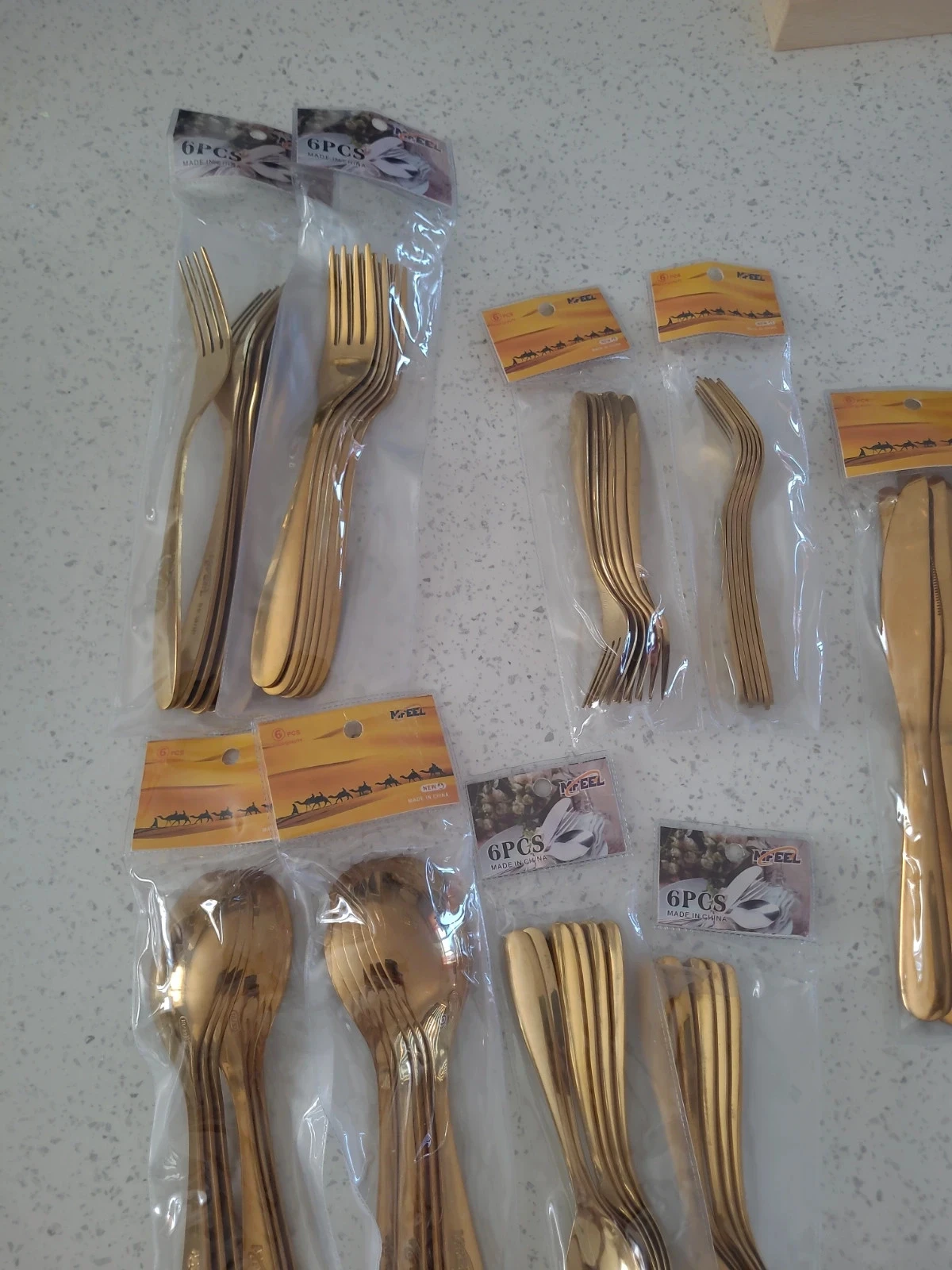 Set of gold cutlery for 12 people – photo 4